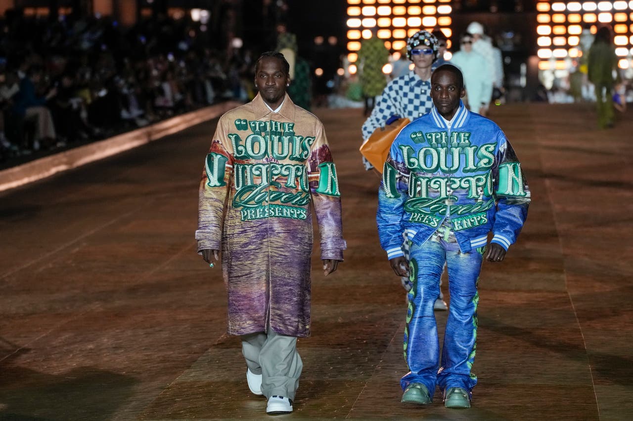 Pharrell Williams shows Louis Vuitton debut collection in front of