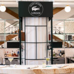 Lacoste brings its tennis clubhouse to Selfridges