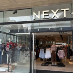 NEXT lifts profit outlook again after overseas and summer sales surge